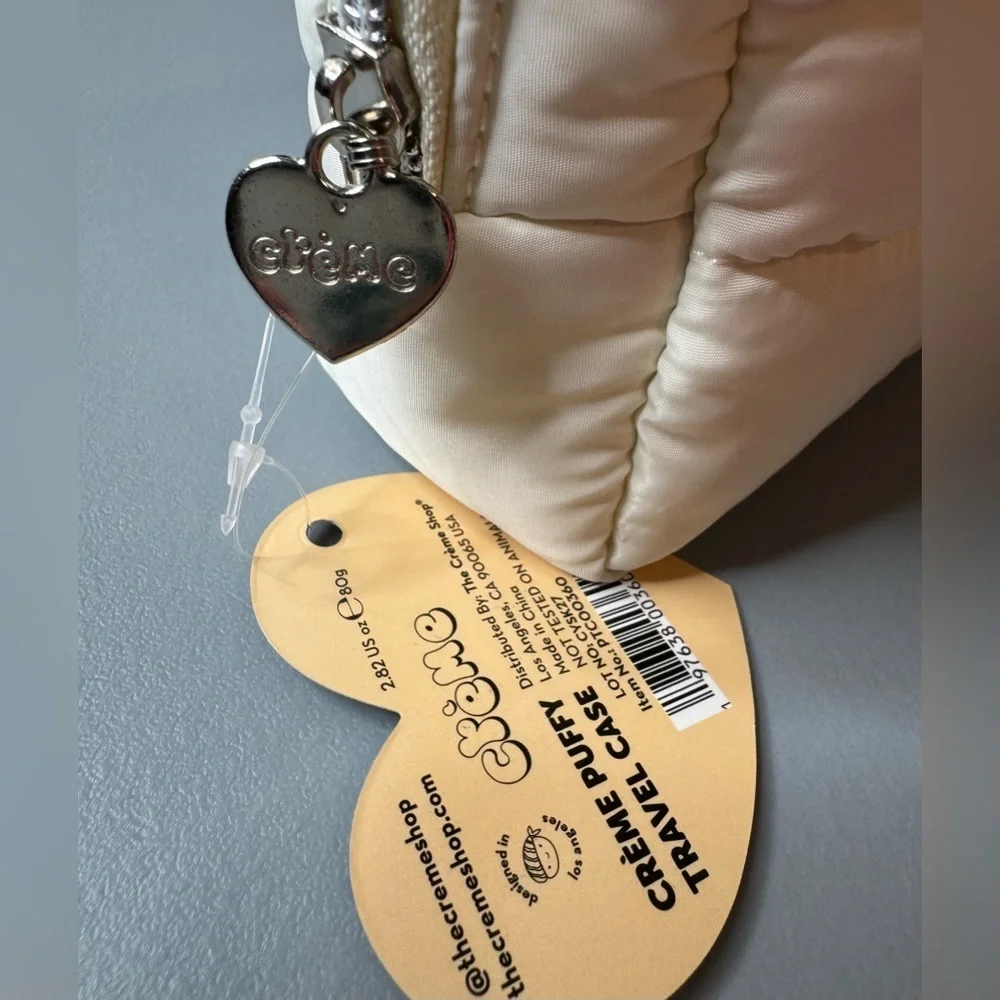 The creme shop Elegant Cream Quilted puffy Cosmetic Bag
